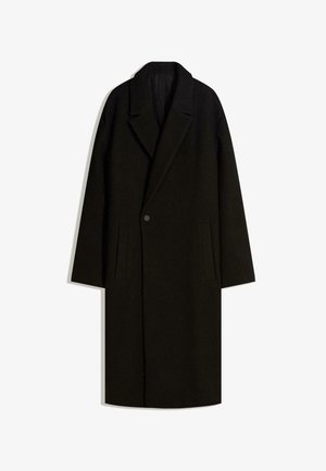 Long black wool overcoat with wide collar, single-button closure, and side slit pockets, displayed flat on white background.