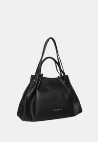 Borsa a tracolla in pelle nera con doppi manici, texture morbida e accento del logo in oro. Caratterizzata da un design spazioso con una leggera arricciatura nella parte superiore.