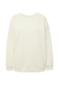 Sudadera de color crema claro, fabricada con un tejido suave. Presenta un cuello redondo, hombros caídos, puños acanalados y un dobladillo acanalado. Detalle de texto en la manga.