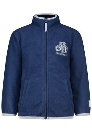 Marineblaue Fleecejacke mit hohem Kragen, Frontreißverschluss und Seitentaschen. Mit einem Traktor-Grafik und dem Text "TRACTOR DRIVER" in Hellblau.