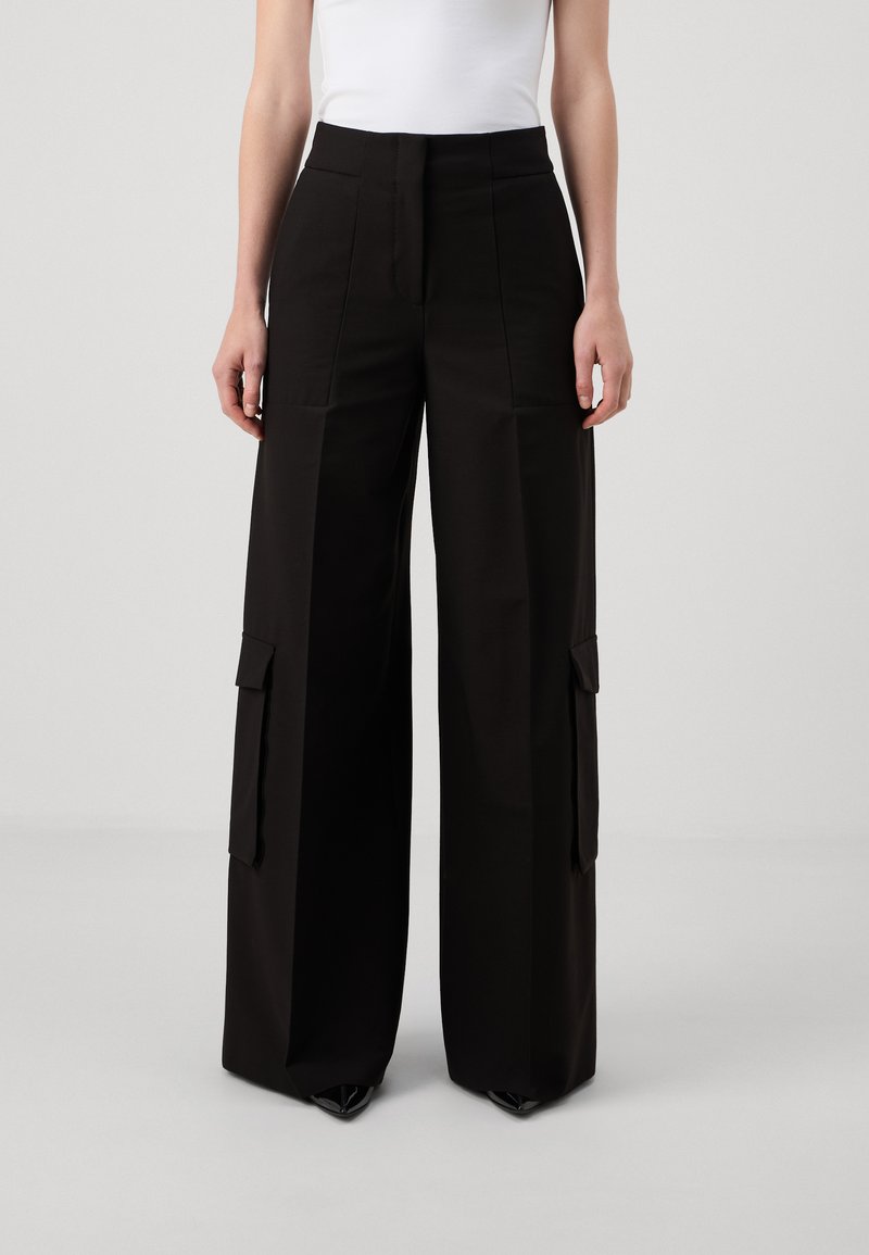 HUGO HIMANA - Pantalon cargo - black
