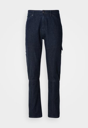 Mörkblå denimbyxor med raka ben, framknäppning med knapp och dragkedja, två framfickor och förstärkta knäpaneler.