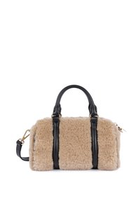 Beige faux fur handbag with black leather accents, rounded handles, and a detachable shoulder strap; features gold hardware and zip closure.