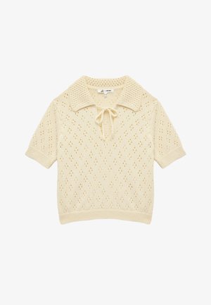 Kortærmet strikket sweater i cremet beige med krave, mønster i lace, bindebånd og ribbet manchetter og nederkant.