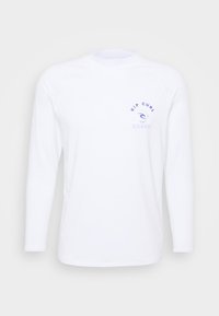 Hvit langermet skjorte laget av lett stoff, med rund hals, raglanærmer, og en blå logo med "Rip Curl" og "Hawaii."