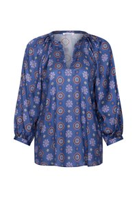 Blouse bleue à manches longues avec des motifs floraux et circulaires violets, col en V, épaules froncées et manches à revers.
