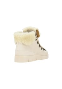 Beige ankle boots with a faux fur collar, lace fastening, a textured sole, and metal hardware accents for durability. Smooth fabric finish.