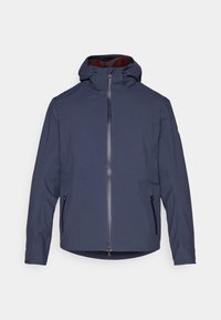 Navy blue waterproof jacket featuring a hood, front zip closure, and two side pockets. Smooth texture and slightly tapered fit.