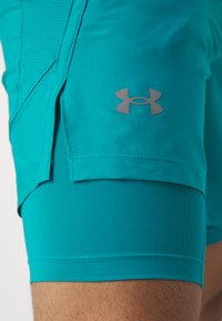 Under Armour LAUNCH - Pantalón corto de deporte - circuit teal