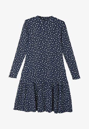 Granatowa sukienka z długim rękawem, wykonana z fakturowanej tkaniny z białymi, liściastymi wzorami; posiada rozkloszowaną spódnicę i okrągły dekolt.