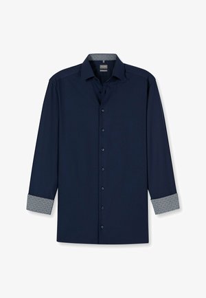 Marineblaue Langarmbluse mit gemustertem Besatz an den Ärmeln und am Kragen, mit einer Knopfleiste und einem glatten, strukturierten Stoff.