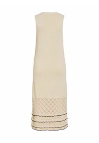 Robe beige sans manches en maille avec motif losange et ourlet festonné avec bordure noire en bas.
