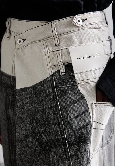 Feng Chen Wang DECONSTRUCTION PANTS UNISEX - Relaxed fit jeans - black
