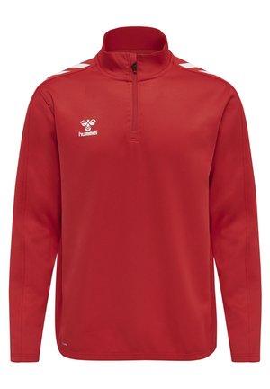 Rode pullover met een ritskraag, lange mouwen en witte chevrons op de schouders; beschikt over het "Hummel" logo op de borst.