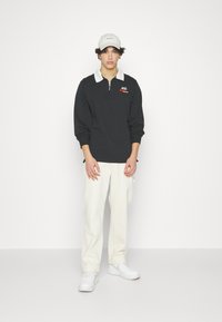 Nike Sportswear TREND RUGBY - Sweatshirt - black/sail