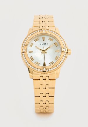 Goldfarbene Guess-Armbanduhr mit kristallbesetzter Lünette, Perlmuttzifferblatt, römischen und kristallinen Stundenmarkierungen sowie einem Gliederarmband aus Metall.