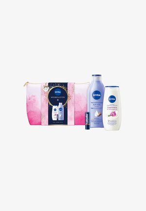 NIVEA skincare gift set with a pink ombre cosmetic bag, includes blue body wash, cream, and blue lip balm, labeled accordingly.