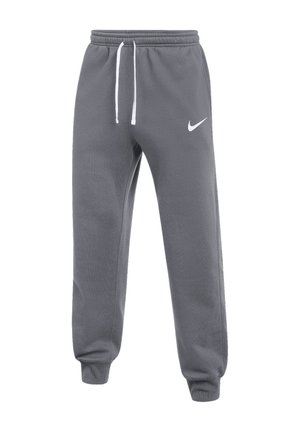 Graue Nike-Sweatpants mit weißem Kordelzug und Logo, elastischem Bund und Bündchen, auf weißem Hintergrund dargestellt.