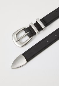Black leather belt with a silver metal buckle, featuring horizontal bars and a pointed end. Smooth texture and straightforward design.