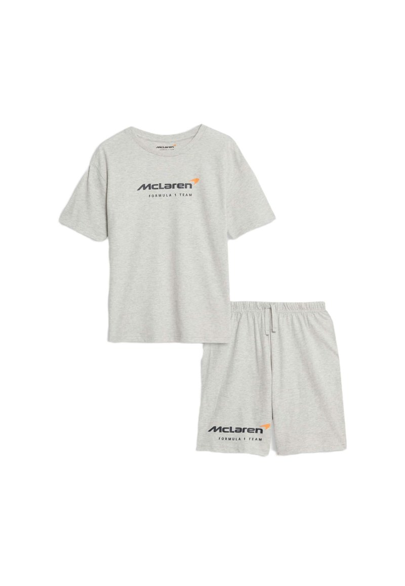 Grijze set van een T-shirt met korte mouwen en shorts. Gemaakt van zachtmateriaal. Bevat het logo van "McLaren Formula 1 Team" op beide stukken. Relaxte fit.
