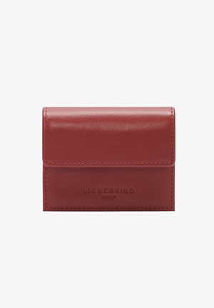 Red leather wallet with a smooth texture, folded design, and embossed logo on the front. Features visible stitching accents. Compact shape.