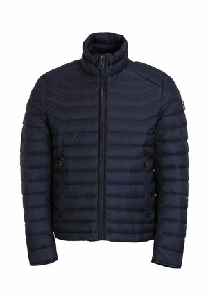 Marineblauwe pufferjack met een hoge kraag, lichtgewicht gestikte ontwerp, en ritszakken aan beide zijden, met een elegante, gladde textuur.