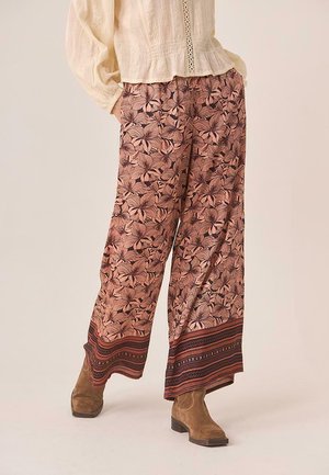 FLORES CENEFA - Pantalones - albaricoque