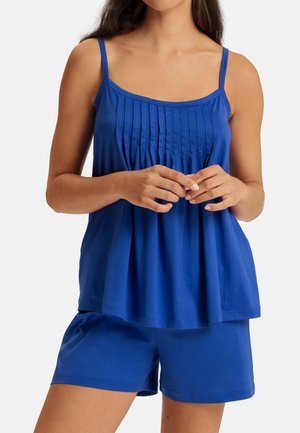 Blue sleeveless top with pleated design, paired with matching blue shorts. Made of soft fabric with a relaxed fit.