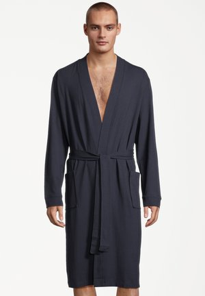 Dark blue bathrobe made of soft fabric, featuring long sleeves, a shawl collar, two front pockets, and a matching belt.