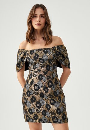 Off-the-shoulder dress featuring a floral pattern in gold, black, and gray, with a fitted silhouette and textured fabric.