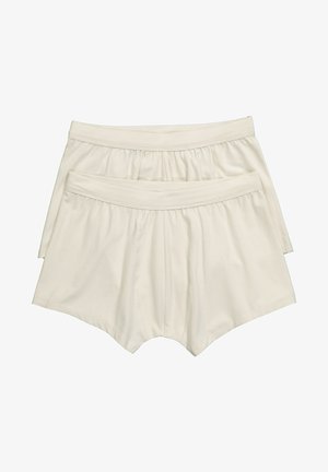 Beige Baumwoll-Boxershorts mit einem weichen Bund, gerafften Beinöffnungen und einer glatten Textur. Zwei Paare sind abgebildet, eines oben auf dem anderen.