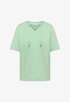 Haut côtelé vert clair à manches courtes avec col en V et cordons réglables, fabriqué par la marque Cecil.
