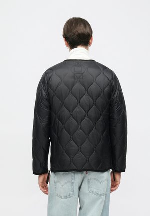 Rank 7: TAION - V NECK ZIP UNISEX - Down jacket