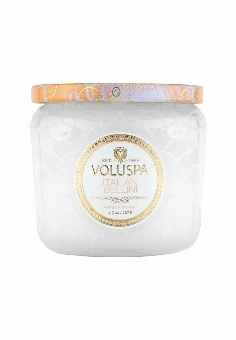 Genomskinlig glasburk med ljus med strukturerad yta, orange och guldig lock, märkt "Voluspa Italian Bellini," handgjord cocowax, 4,5 oz.