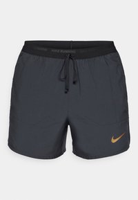 JAKOB INGEBRIGTSEN SHORT - Short de sport - black/metallic gold