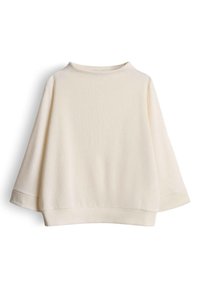 Crèmekleurige geribbelde top met een boothals, brede driekwart mouwen en een losse pasvorm. Zachte textuur met een gladde afwerking.