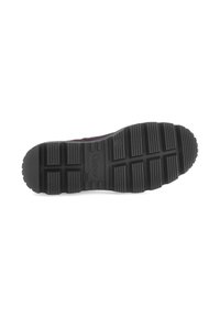 Black rubber shoe sole with rectangular and horizontal ridges for traction; features embossed branding and a curved, rounded toe design.
