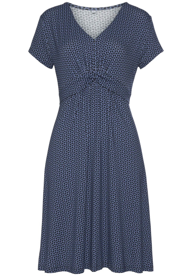 Vestido de marine con mangas cortas, escote en V, detalle frontal anudado y un patrón de pequeños puntos negros. Tela suave y fluida con un dobladillo acampanado.