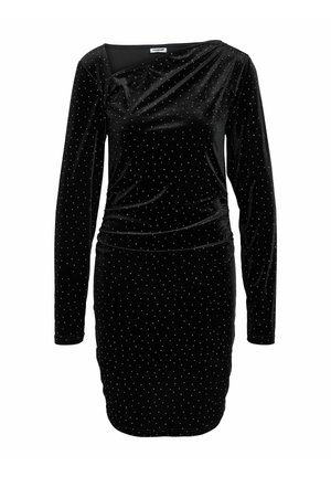 Sort fløjls kjole med lange ærmer, asymmetrisk halsudskæring og spredte sølvprikker. Figursyet silhuet med rynket detalje ved taljen.