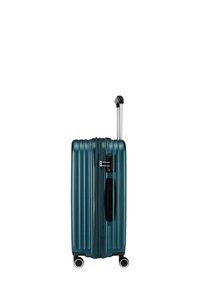 Valigia rigida teal con scanalature verticali, manico retrattile e quattro ruote. Include una chiusura a combinazione e una maniglia laterale per un facile sollevamento.