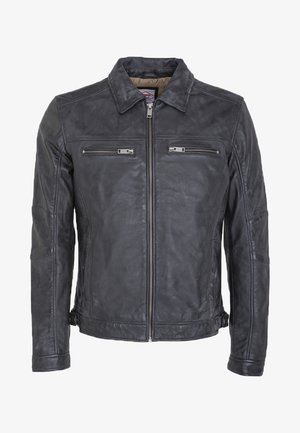 Schwarze Lederjacke mit kragenförmigem Ausschnitt, zwei mit Reißverschluss verschließbaren Brusttaschen und Seitentaschen. Weiche Textur mit Nahtdetails.