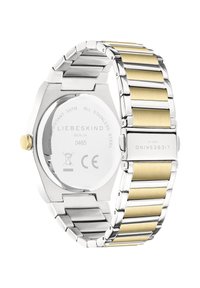 Orologio in acciaio inox con bracciale bicolore; maglie argentate e dorate, cassa ottagonale e retro in vetro mineralizzato con marchio inciso.
