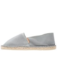 Gray canvas espadrille with a pointed toe, jute rope sole, and stitching detail along the edge. Minimal branding tag visible on the side.