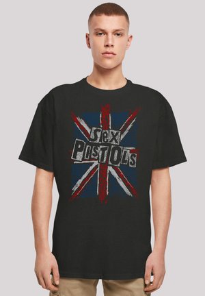 Black t-shirt featuring a graphic design with a distressed Union Jack and the text "Sex Pistols" in bold, contrasting colors.