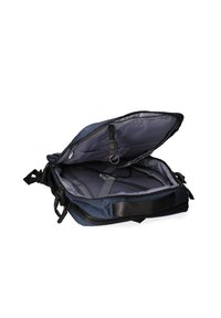 Zaino in tessuto blu con interni grigi, dotato di apertura con zip, cinghie interne e tasca per l'organizzazione.