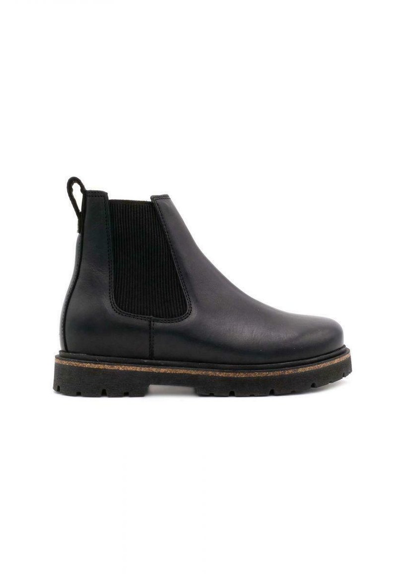 Bottine Chelsea en cuir noir avec panneaux élastiques sur les côtés, accents en tissu texturé et semelle en caoutchouc noir robuste. Design compact avec une languette de tirage.