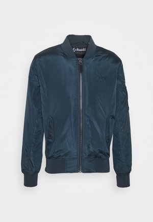 Tmavě modrá bomber bunda vyrobená z lesklého nylonového materiálu. Obsahuje zapínání na zip, žebrované manžety a pas, boční kapsy a detail s logem.