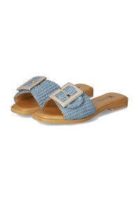 Blue woven slip-on sandals featuring a large rhinestone buckle, brown sole, and open toe design for breathability and comfort.