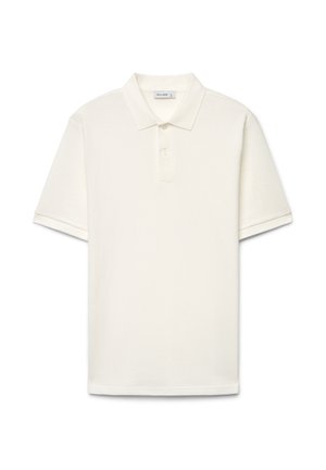 Polo bianca a maniche corte con tessuto strutturato, patta con due bottoni e colletto classico, mostrata su uno sfondo bianco uniforme.