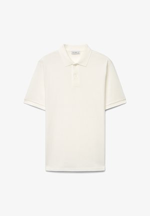 Polo bianca a maniche corte con tessuto strutturato, patta con due bottoni e colletto classico, mostrata su uno sfondo bianco uniforme.